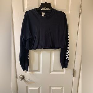 Woman’s long checkered sleeve crop top